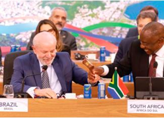 President Cyril Ramaphosa and Brazilian President Luiz Inácio Lula da Silva strike the ceremonial gavel marking the handover of the G20 Presidency to South Africa in 2025