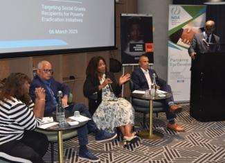 Panelists who led the Understanding Poverty in South Africa session: Dr Pat Naicker of SASSA, Mr Brendan Pearce CEO of Finmark Trust, Ms Namhla Mniki – The Presidency and Mr Ashwell Jenneker of STATSSA.