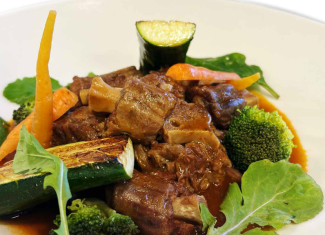 braised ostrich neck with steamed dumplings and pan-grilled vegetables