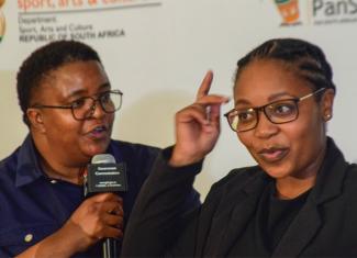 Deputy Minister for Women, Youth and People with Disabilities Mmapaseka Steve Letsike and SASL Interpreter, Ms Nomsa Mathebula.